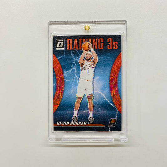 2023-24 Optic Devin Booker Raining 3s International Red Scope